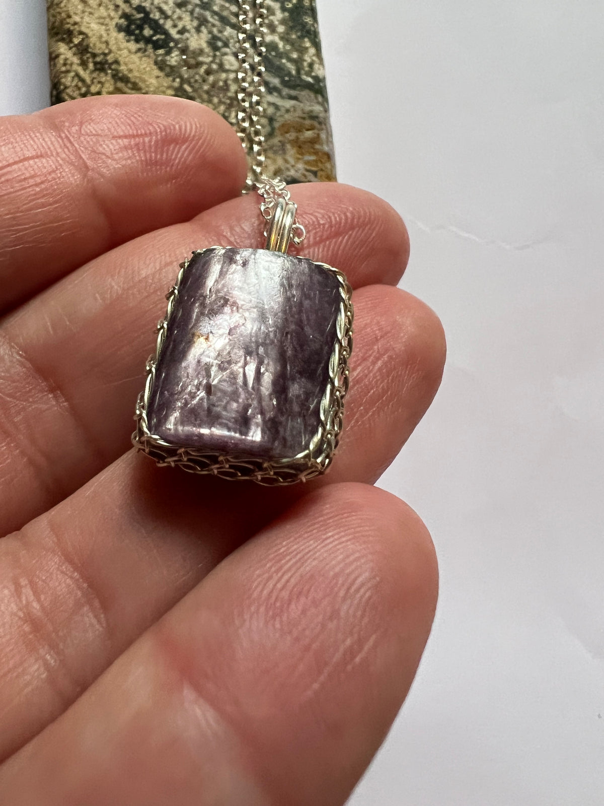 Handmade Lepidolite Pendant on a sterling silver necklace.