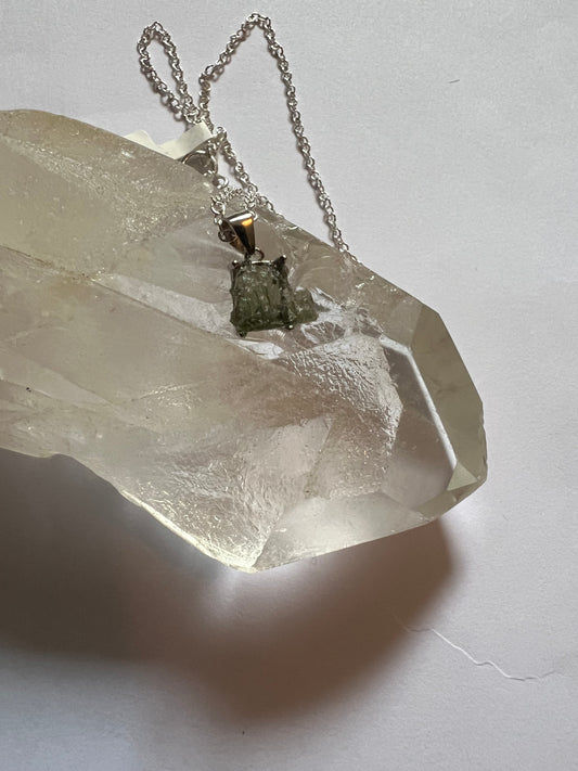Moldavite pendant on a sterilizing silver chain necklace