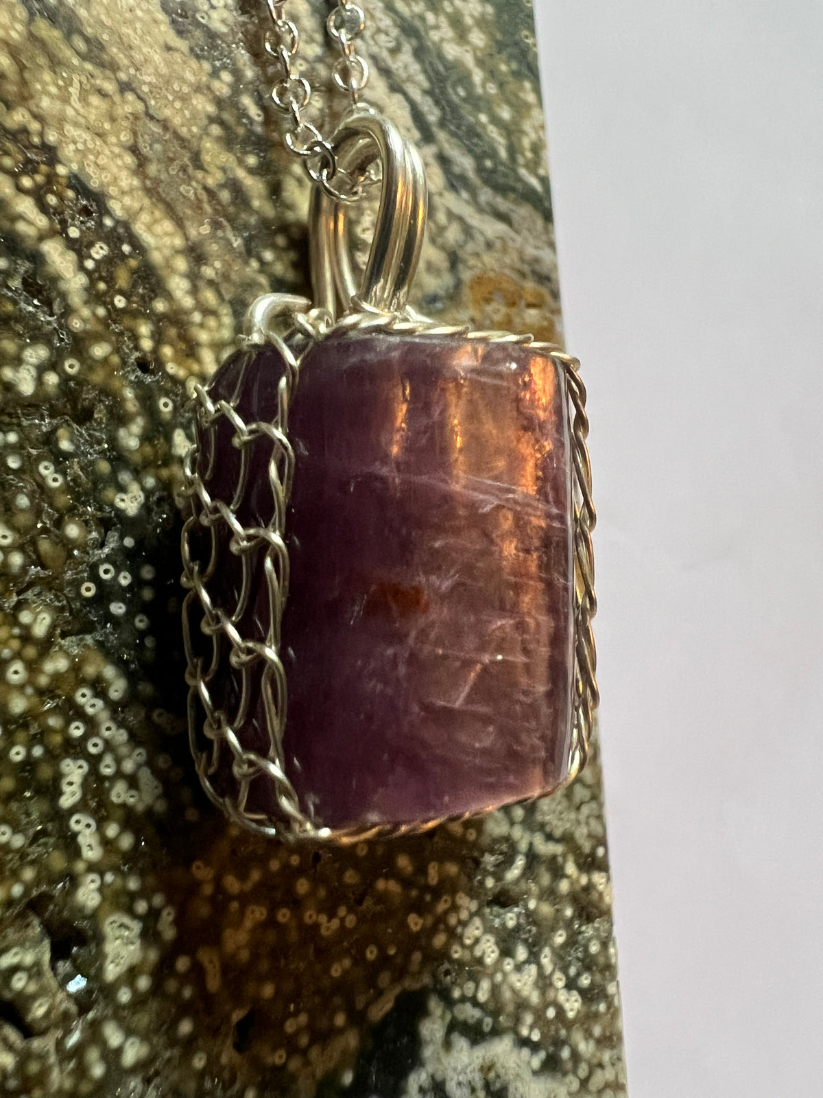 Handmade Lepidolite Pendant on a sterling silver necklace.