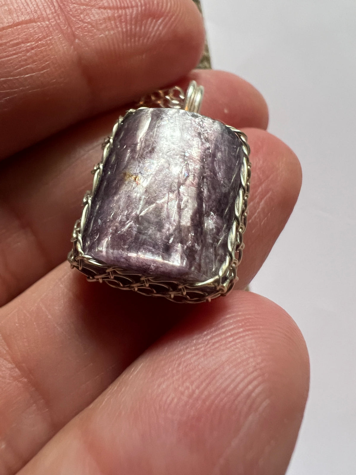 Handmade Lepidolite Pendant on a sterling silver necklace.